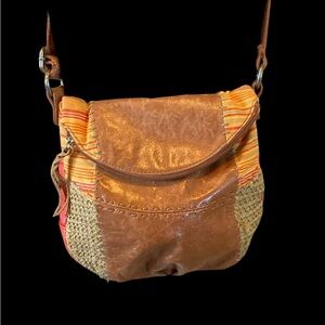 The Sak Ventura crossbody bag. Magnet closure, pockets. Brown, multi fabric.